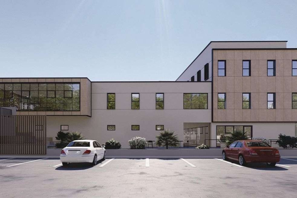 Façade arrière et salle vitrée